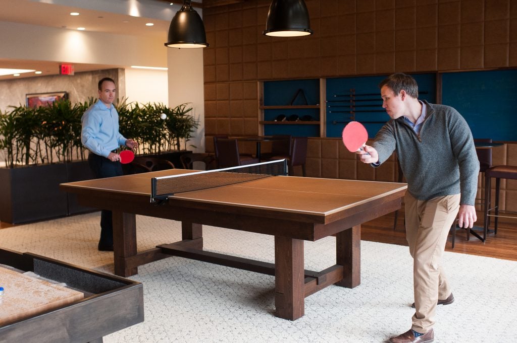 men playing ping pong