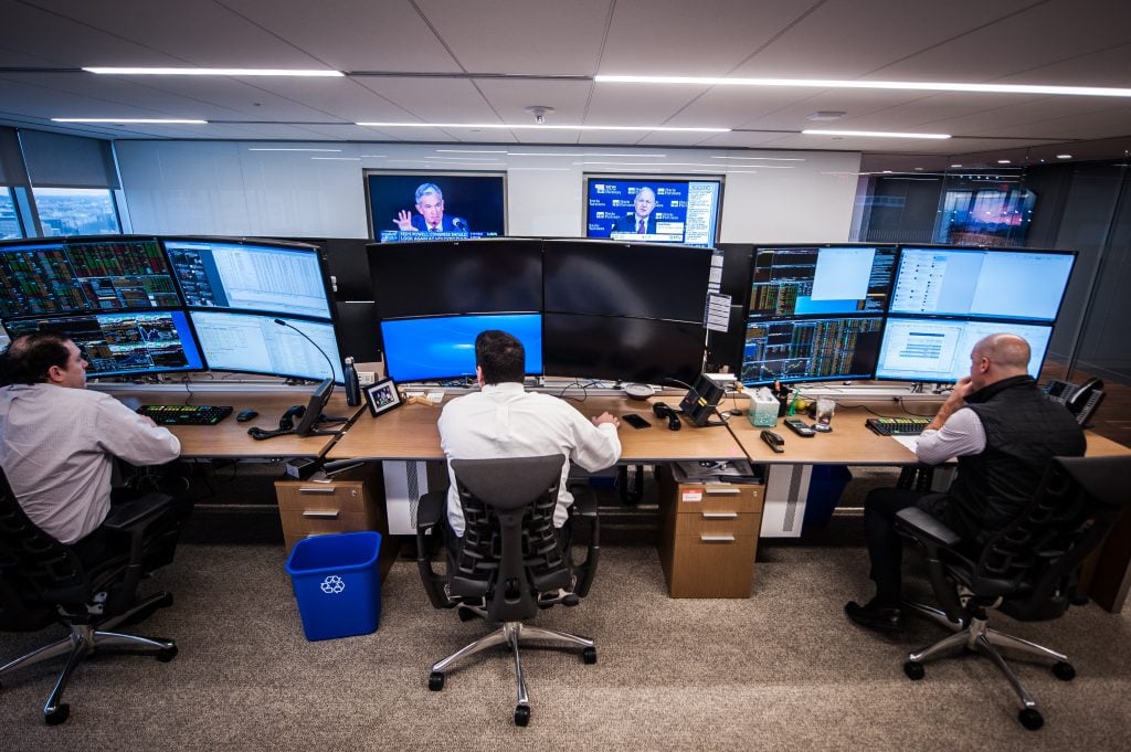 men working at the computer