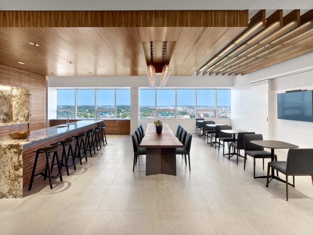 SCM Cafe 31 spacious kitchen with chairs and a view of the city