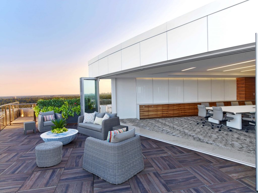 terrace with comfortable chairs and a conference room