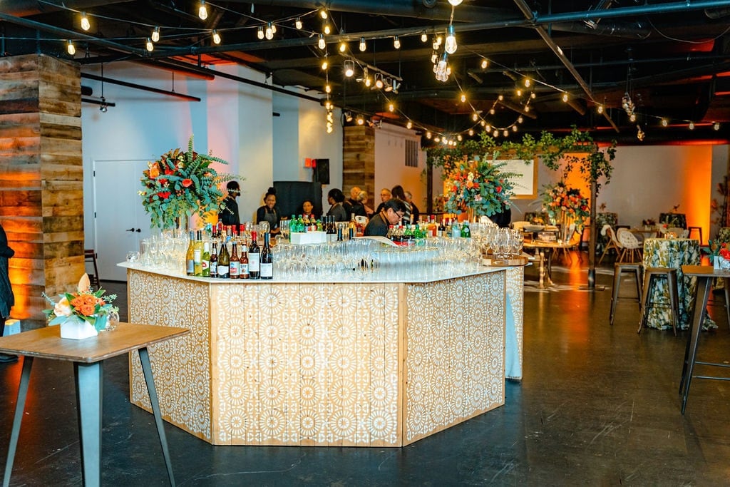 table with champagne glasses and bottles